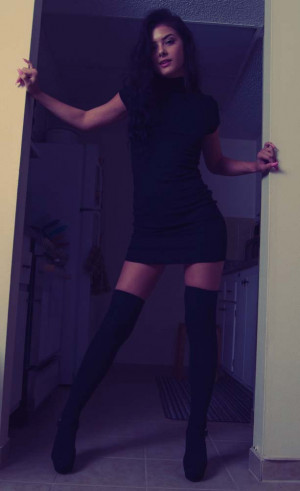 Lola Sinclair high heels, black dress, sexy legs, brunette